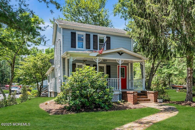 276 Chandler Rd, Jackson, NJ 08527 - view of front of house featuring a porch and a front yard