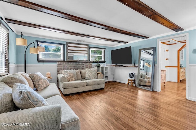 276 Chandler Rd, Jackson, NJ 08527 - living room featuring a wainscoted wall, beamed ceiling, and wood finished floors