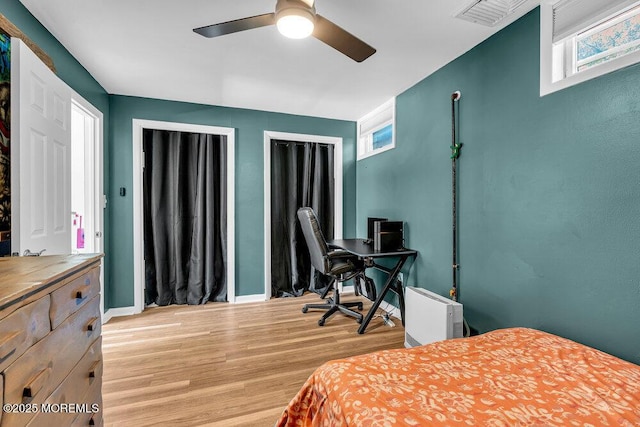 276 Chandler Rd, Jackson, NJ 08527 - bedroom with light wood-style floors, multiple windows, an office area, and a ceiling fan