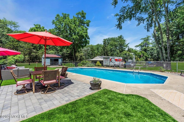 276 Chandler Rd, Jackson, NJ 08527 - view of swimming pool with a patio, a shed, and view of scattered trees