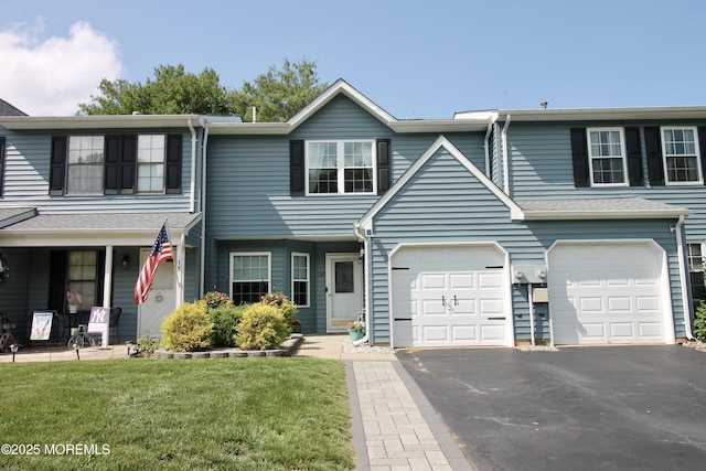 20 Atlantis Ter, Freehold, NJ 07728 - view of property featuring driveway, a front yard, and an attached garage