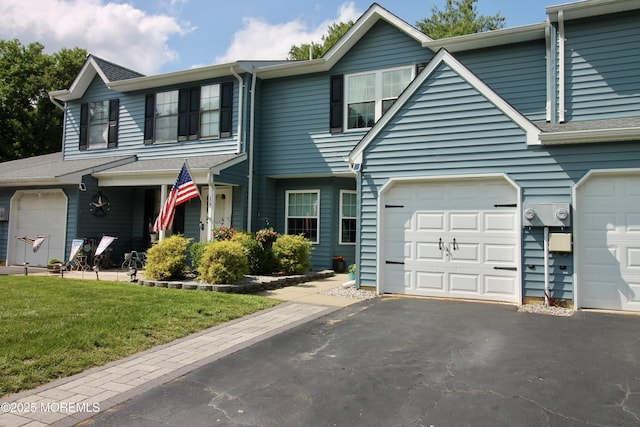 20 Atlantis Ter, Freehold, NJ 07728 - townhome / multi-family property with driveway and a front lawn