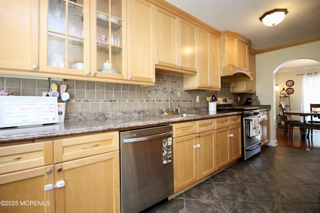 20 Atlantis Ter, Freehold, NJ 07728 - kitchen with appliances with stainless steel finishes, arched walkways, ornamental molding, light brown cabinets, and tasteful backsplash
