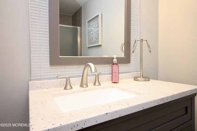 20 Atlantis Ter, Freehold, NJ 07728 - bathroom view of backsplash, vanity, and an enclosed shower