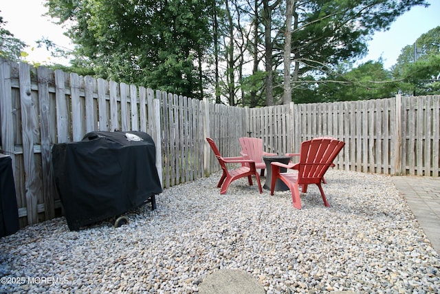 20 Atlantis Ter, Freehold, NJ 07728 - fenced backyard featuring area for grilling