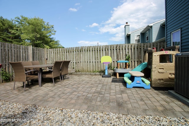 20 Atlantis Ter, Freehold, NJ 07728 - fenced backyard with outdoor dining space and a patio area