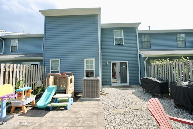 20 Atlantis Ter, Freehold, NJ 07728 - back of property with a patio area