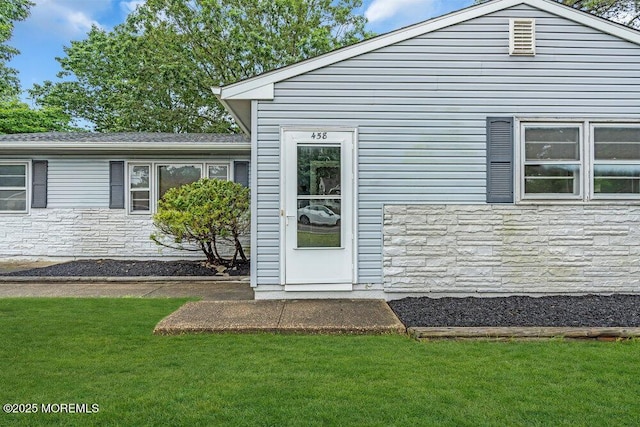458 Drum Point Rd, Brick, NJ 08723 - property entrance featuring stone siding and a lawn