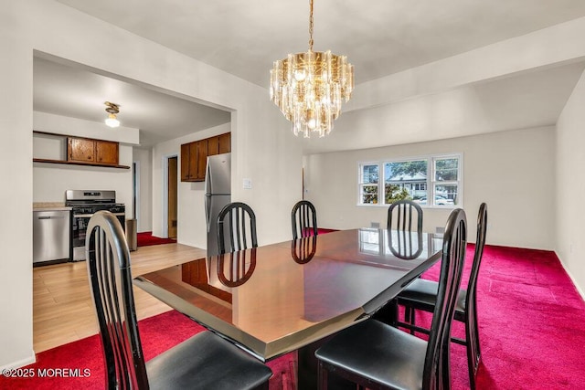 458 Drum Point Rd, Brick, NJ 08723 - dining area featuring a chandelier and light wood finished floors