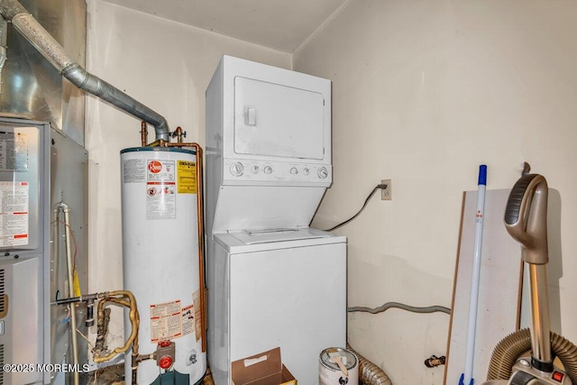 458 Drum Point Rd, Brick, NJ 08723 - washroom with water heater and stacked washer / drying machine