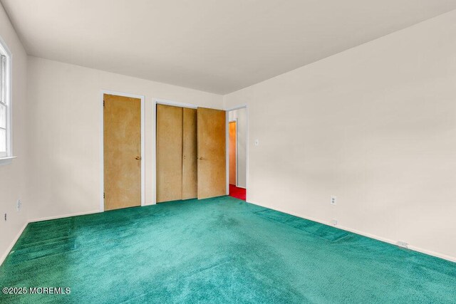 458 Drum Point Rd, Brick, NJ 08723 - unfurnished bedroom featuring carpet floors and baseboards