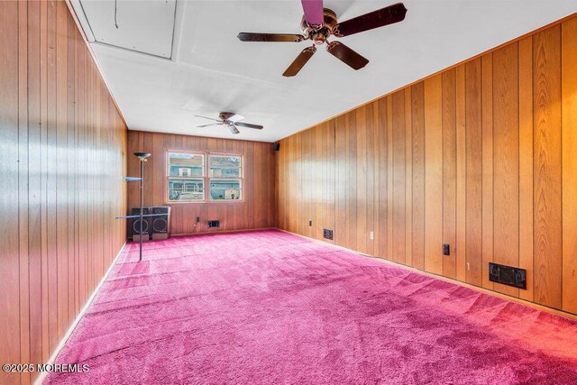 458 Drum Point Rd, Brick, NJ 08723 - carpeted empty room with a ceiling fan, attic access, and wood walls