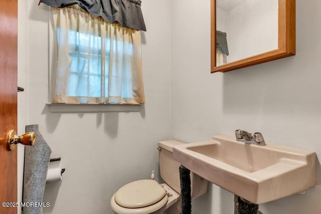 458 Drum Point Rd, Brick, NJ 08723 - half bathroom featuring toilet and a sink