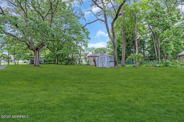 458 Drum Point Rd, Brick, NJ 08723 - fenced yard featuring a storage unit