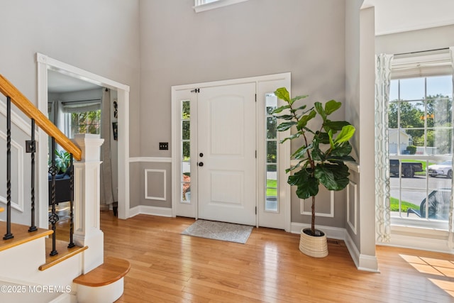 43 Sweet Gum Rd, Howell, NJ 07731 - foyer with light wood-style floors, stairs, and a high ceiling