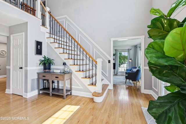 43 Sweet Gum Rd, Howell, NJ 07731 - entrance foyer featuring wood-type flooring, a high ceiling, and stairs