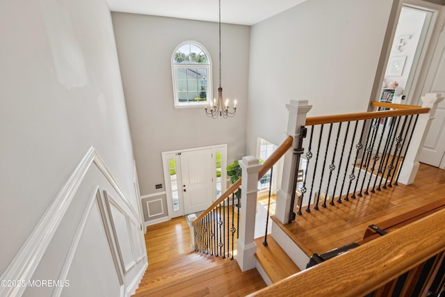 43 Sweet Gum Rd, Howell, NJ 07731 - foyer with wood finished floors, a high ceiling, and a chandelier