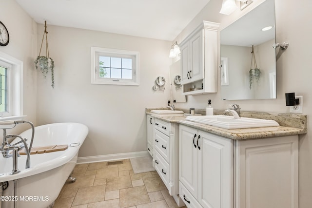 43 Sweet Gum Rd, Howell, NJ 07731 - full bathroom with double vanity and a freestanding tub