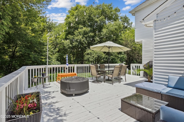 43 Sweet Gum Rd, Howell, NJ 07731 - wooden terrace with outdoor dining space, an outdoor living space, and view of scattered trees