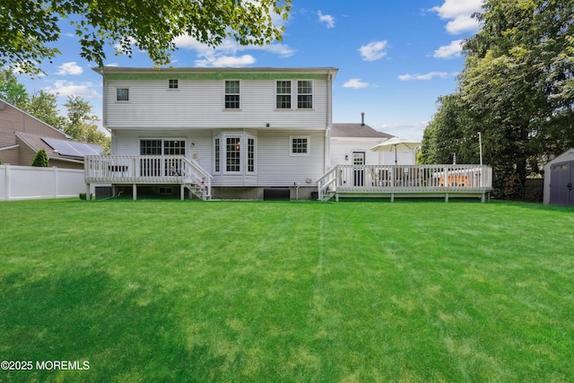 43 Sweet Gum Rd, Howell, NJ 07731 - back of property featuring a wooden deck and a storage unit