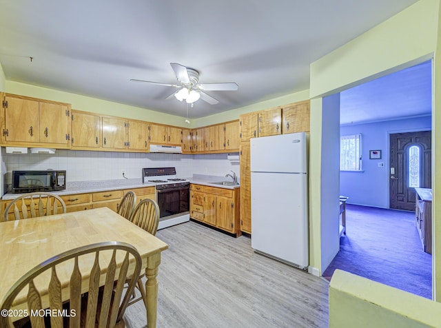 162 Attison Ave, Toms River, NJ 08757 - kitchen with white appliances, under cabinet range hood, light countertops, tasteful backsplash, and a ceiling fan
