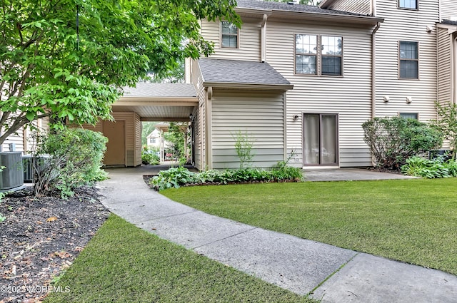 1106 Lilly Ln, Jackson, NJ 08527 - view of front of home with a front lawn and a shingled roof