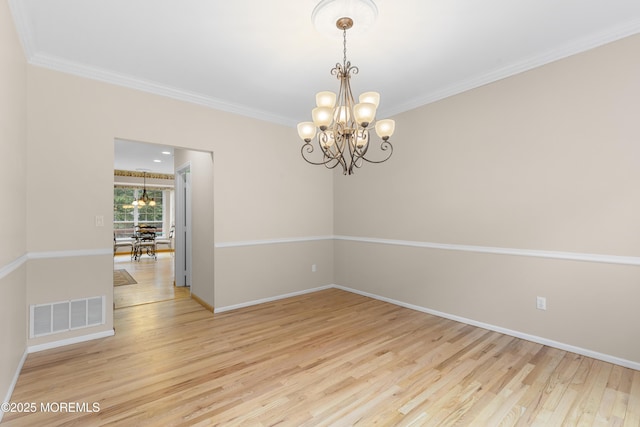 3 Canterbury Ct, Jackson, NJ 08527 - empty room with a chandelier, wood finished floors, and ornamental molding