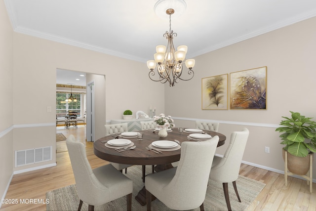 3 Canterbury Ct, Jackson, NJ 08527 - dining room featuring a chandelier, light wood-style floors, and ornamental molding