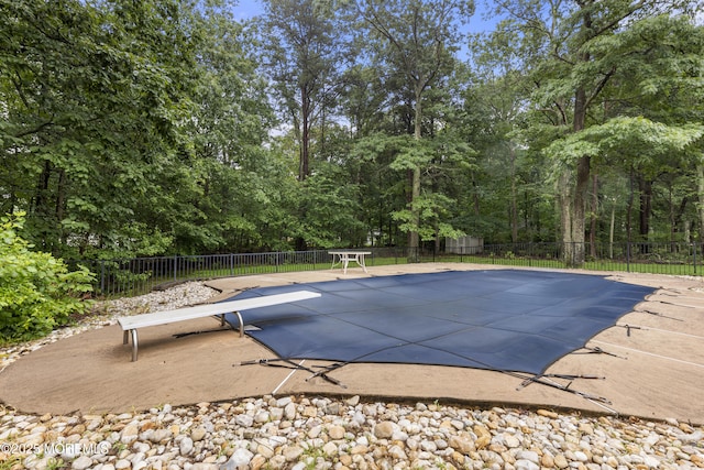 3 Canterbury Ct, Jackson, NJ 08527 - view of swimming pool with a diving board and a patio