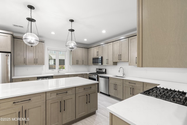 92 Wadsworth Ave, Lakewood, NJ 08701 - kitchen with stainless steel appliances, light countertops, pendant lighting, and recessed lighting