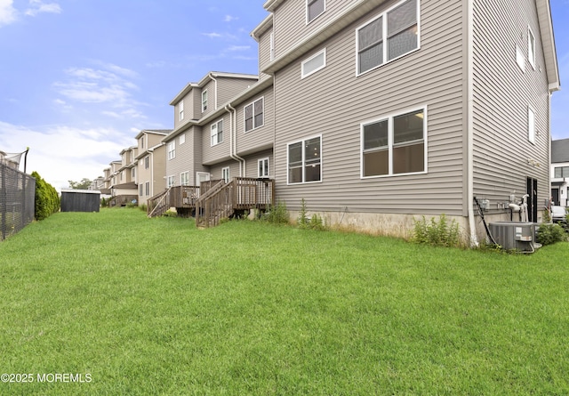 92 Wadsworth Ave, Lakewood, NJ 08701 - rear view of house with a residential view and a wooden deck