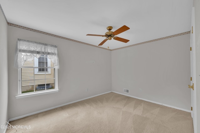 23 Dexter Ln, Jackson, NJ 08527 - empty room with light carpet, ceiling fan, and ornamental molding
