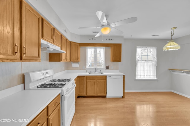 23 Dexter Ln, Jackson, NJ 08527 - kitchen with white appliances, under cabinet range hood, a ceiling fan, and healthy amount of natural light