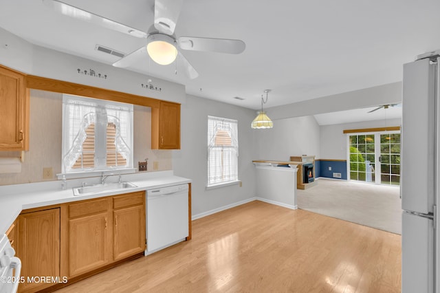 23 Dexter Ln, Jackson, NJ 08527 - kitchen featuring white dishwasher, ceiling fan, light wood-style flooring, freestanding refrigerator, and open floor plan