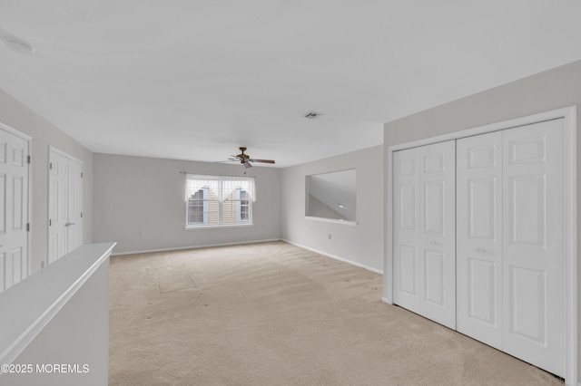 23 Dexter Ln, Jackson, NJ 08527 - unfurnished living room featuring light carpet and ceiling fan