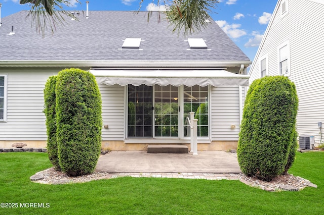 23 Dexter Ln, Jackson, NJ 08527 - back of house with a yard, a patio area, and roof with shingles