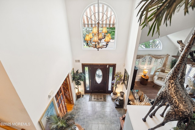 648 Point Ave, Brick, NJ 08724 - foyer entrance featuring a high ceiling and a chandelier