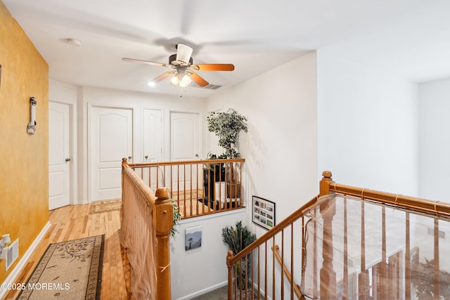 648 Point Ave, Brick, NJ 08724 - corridor with an upstairs landing and light wood-style flooring