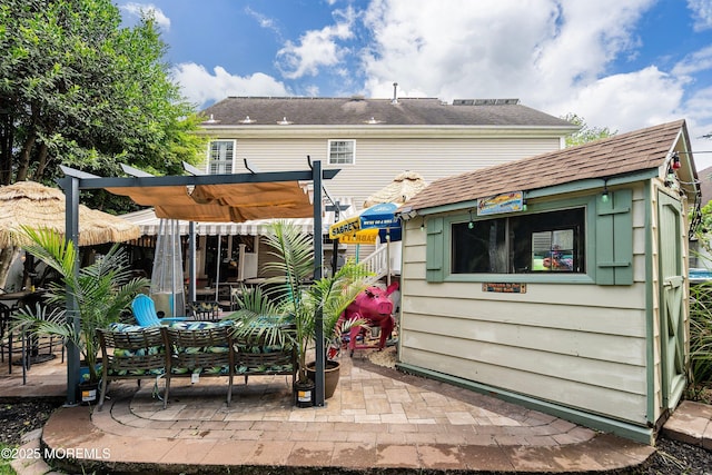 648 Point Ave, Brick, NJ 08724 - back of house featuring a patio area, a pergola, and an outdoor structure