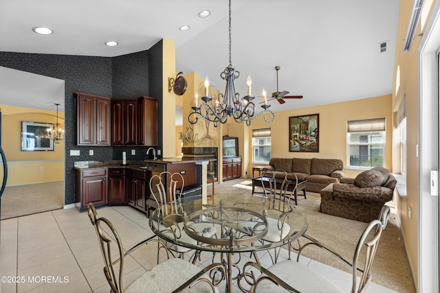 6 Boticelli Ct, Manchester, NJ 08759 - dining room with a chandelier, light carpet, high vaulted ceiling, wallpapered walls, and recessed lighting