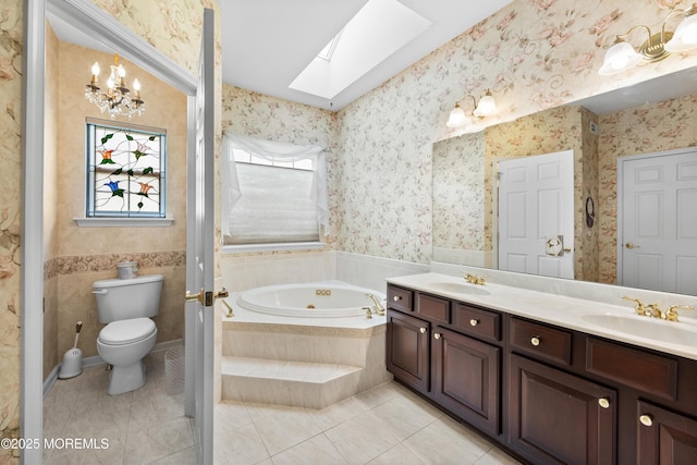 6 Boticelli Ct, Manchester, NJ 08759 - bathroom with a skylight, a jetted tub, double vanity, wallpapered walls, and tile patterned flooring