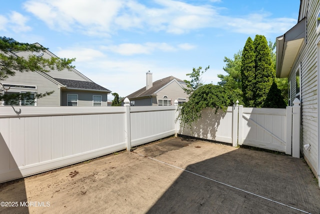 6 Boticelli Ct, Manchester, NJ 08759 - view of patio / terrace featuring a gate