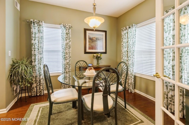 10 Inkberry Ln, Howell, NJ 07731 - dining room with wood finished floors and healthy amount of natural light