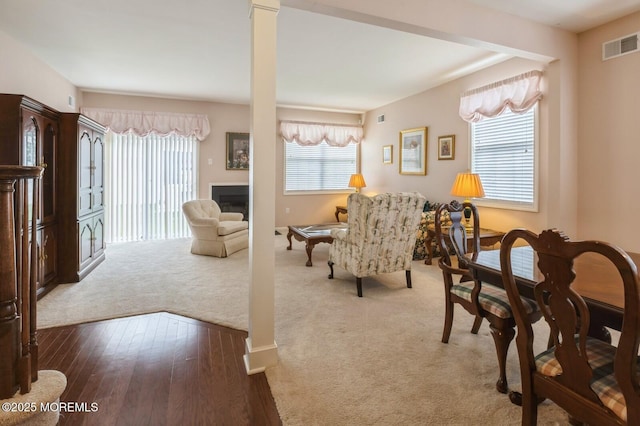 10 Inkberry Ln, Howell, NJ 07731 - living area with a fireplace and wood-type flooring