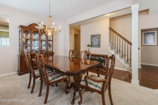 10 Inkberry Ln, Howell, NJ 07731 - dining space with a chandelier, light colored carpet, and stairway
