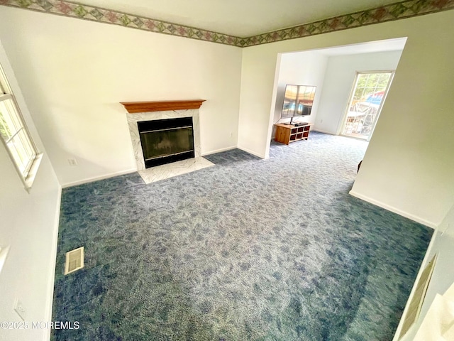 229 Stern Ave, Manahawkin, NJ 08050 - unfurnished living room with a high end fireplace and carpet