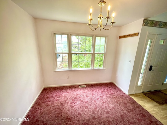 229 Stern Ave, Manahawkin, NJ 08050 - carpeted foyer entrance featuring a chandelier and baseboards
