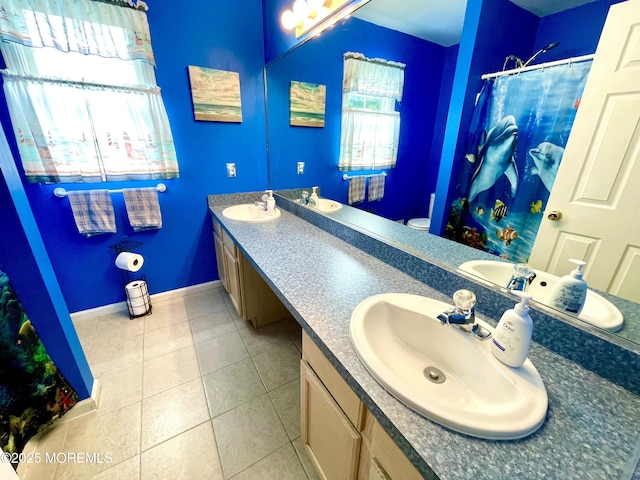 229 Stern Ave, Manahawkin, NJ 08050 - bathroom with double vanity, tile patterned floors, and a shower with shower curtain