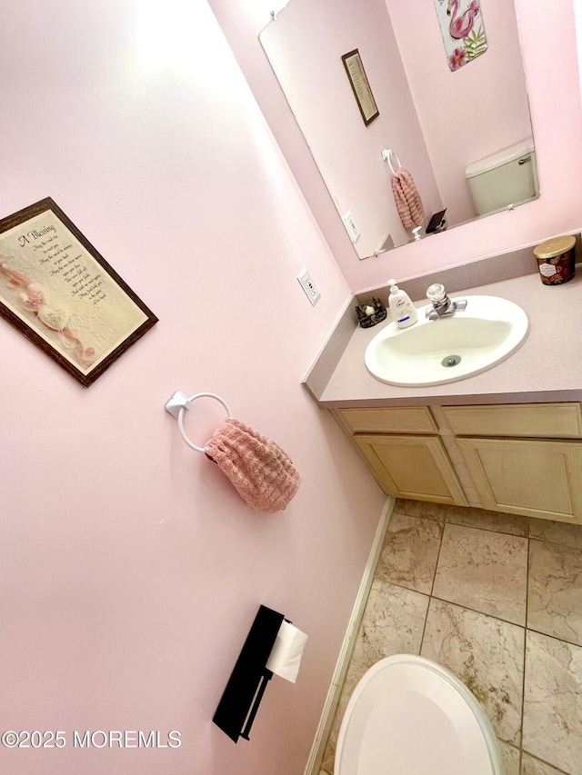 229 Stern Ave, Manahawkin, NJ 08050 - half bath featuring vanity and marble look tile flooring