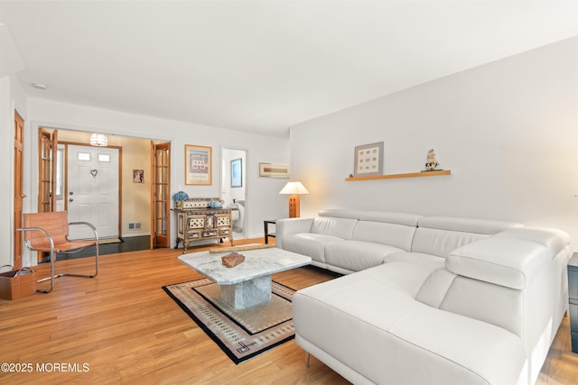 4 Hamilton Hill Rd, Lincroft, NJ 07738 - living room featuring light wood-style floors and baseboards